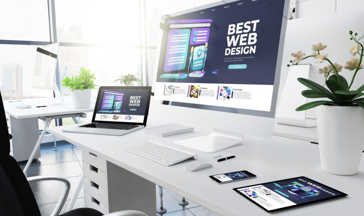 desktop with web design on screen